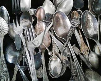 Collectible spoons...other bins and zipper bags full of cutlery