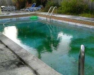 Home for sale: Swimming pool needs maintenance and pressure washing of patio.