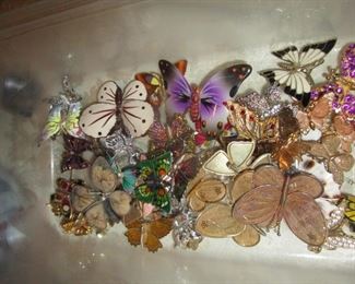 Butterfly pins and broaches