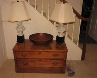 2 drawer chest, carved bowl, sculptural lamps