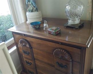 Chippendale style chest with carved fan designs, Waterford lamp, cloissone, etc..