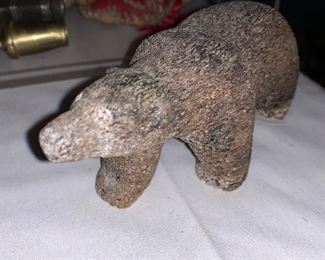 A super cool bear figurine made from bone 