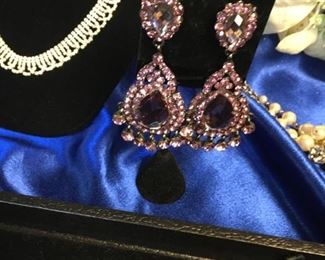 Pink earrings also make a statement.