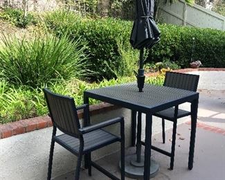 Bar height patio table with chairs and umbrella Crate and Barrel