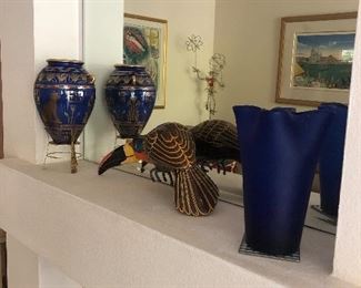 Paper mache toucan, the golden vase of Bast and art glass
