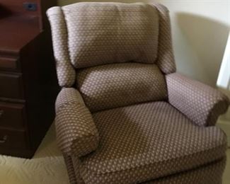 Upholstered glider/recliner