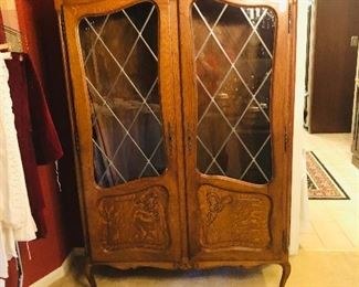 French small armoire, double doors with glass, and moveable shelves