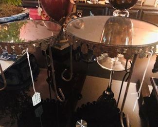 Vintage iron and mirror risers to serve at different heights on buffet table