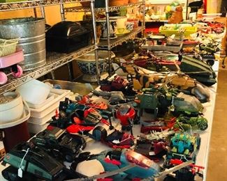 Garage full of vintage toys along with planters and holiday ware