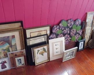 Many pictures that adorned the interior of the Weller home, collected by Nancy