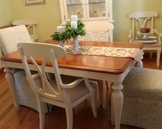 Dining room table and six chairs. There is one leaf for the table.