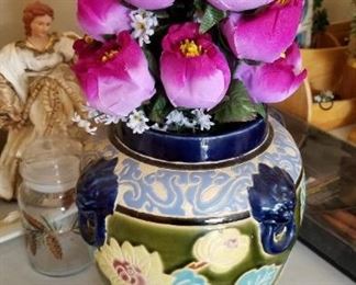 Colorful Silk flowers in a colorful vase