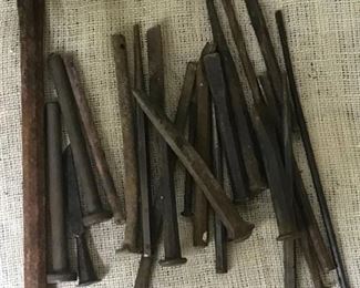 Collection of steel spikes