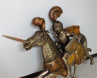 MEDIEVAL ARMORED KNIGHT AND HORSE CHARGING  