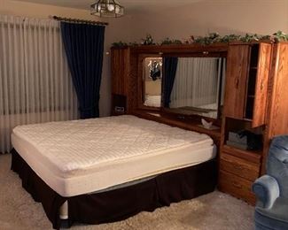  KING SIZE BEDROOM SET IN VERY NICE CONDITION. HEADBOARD/BEDFRAME - DRESSER -ARMOIRE - 2 PIER CABINETS - MATTRESS AND BOXSPRING