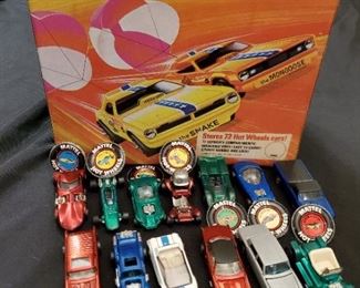 Original 1960s Hot Wheels Red Line vehicles -- dozens in the collection -- with pristine collector's case and badges