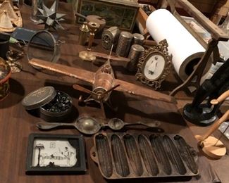 Antique general store cast iron roll paper holder, cast iron figural corn muffin baking pan, parisian black glass buttons, cast brass victorian picture frame, vintage kitchen utensils.