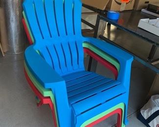 3 plastic Adirondack chairs