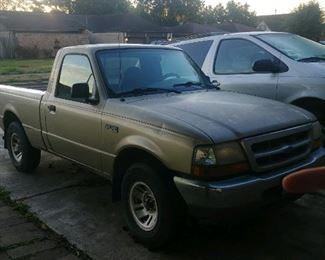 1999 Ranger, 2.5 L, 181,000 miles, New trans, tires & batt. Not pretty but a truck.