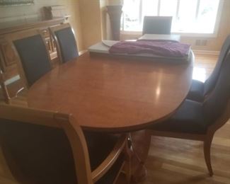 Dining Room table with Leafs, 6 Chairs (2 of which are captain) Table pads.. PECAN wood