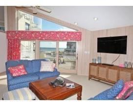 family room packed with furnishings and decor
