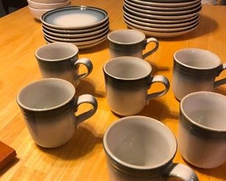 7 mugs on a mission to find their 8th comrade