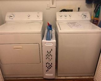 Kenmore washer dryer set with chaperone making sure they keep a safe distance from each other.