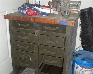 Vintage upright tool chest made of metal with wood top