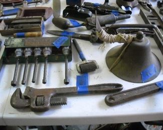 Vintage hand tools. Old brass bell