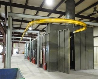 Binks spray booth with an I-beam conveyor system and fire suppression system - includes spare filters and heat lamp – approx. 50’ long