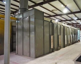 Binks spray booth with an I-beam conveyor system and fire suppression system - includes spare filters and heat lamp – approx. 50’ long