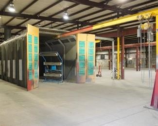 Binks spray booth with an I-beam conveyor system and fire suppression system - includes spare filters and heat lamp – approx. 50’ long