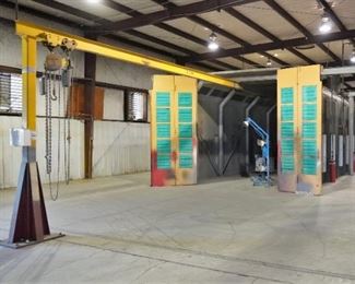 Binks spray booth with an I-beam conveyor system and fire suppression system - includes spare filters and heat lamp – approx. 50’ long