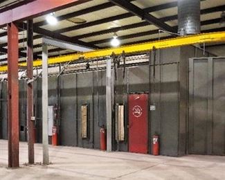 Binks spray booth with an I-beam conveyor system and fire suppression system - includes spare filters and heat lamp – approx. 50’ long