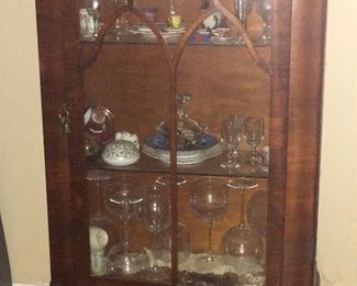 Antique display case with glass items