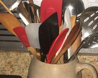 Kitchen utensils and a pottery picture