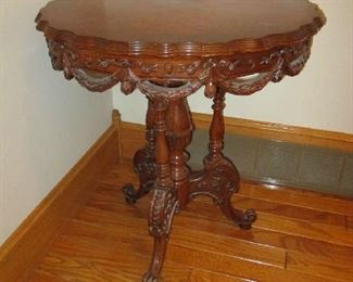 Ornate round end table
