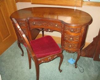 Kidney shaped desk with bench