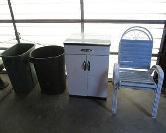 cabinet, chairs and trash cans