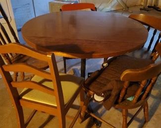 kitchen table with misc chairs