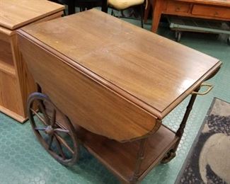 Antique solid wood drop down tea card on wheels 