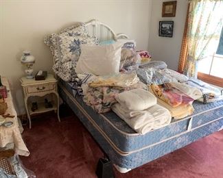 White rod iron bed