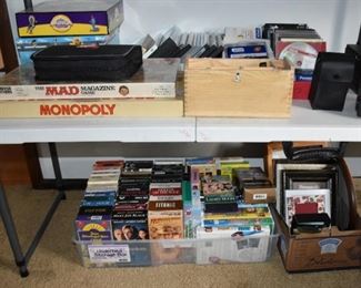 Games Cranium, Monopoly, Mad NOS Game, CD's, VHS, Binoculars, More