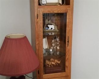 One of two oak cabinets that include parts to join them to make an entertainment unit
