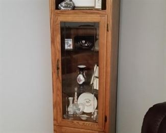 The second of two oak cabinets