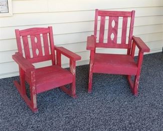 Two small red rockers