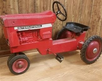 Vintage die-cast pedal International tractor