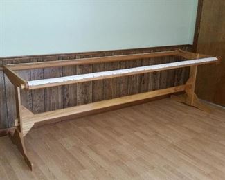 This oak quilting frame is 8 ft. long