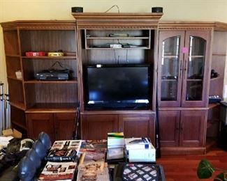 This Entertainment center features a detachable book shelf and cabinet.. spread them around your home.