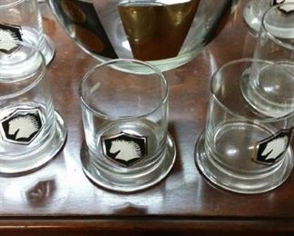 Equestrian broad-based tumblers and matching bowl.